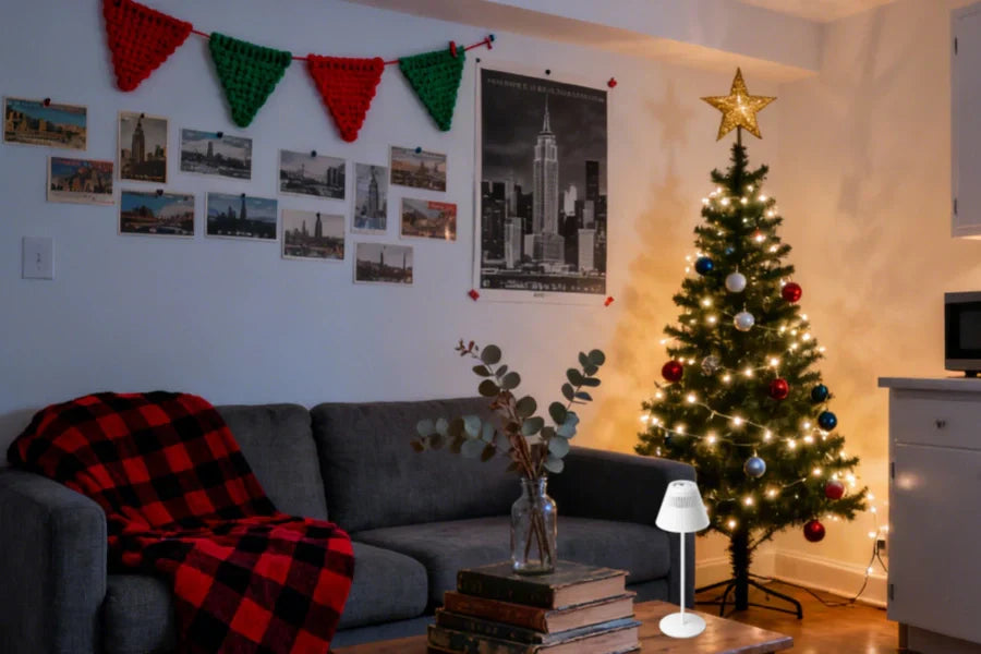 Honeywell M1 wireless lamp providing warm holiday lighting on small apartment desk workspace