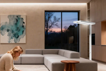 Single floor lamp providing comprehensive lighting coverage for multi-functional minimalist living space