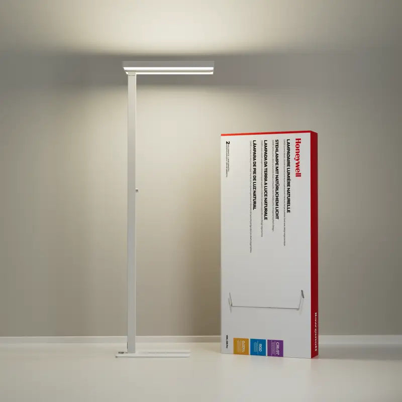 White Honeywell floor lamp with sleek minimalist design and bright eye caring LED lighting for living room and bedroom