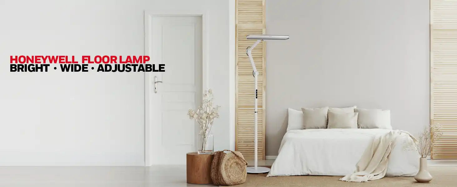 White floor lamp with an adjustable arm and head.