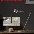 Modern silver-toned honeywell 01a eye protection desk lamp with adjustable articulated arm for office home use