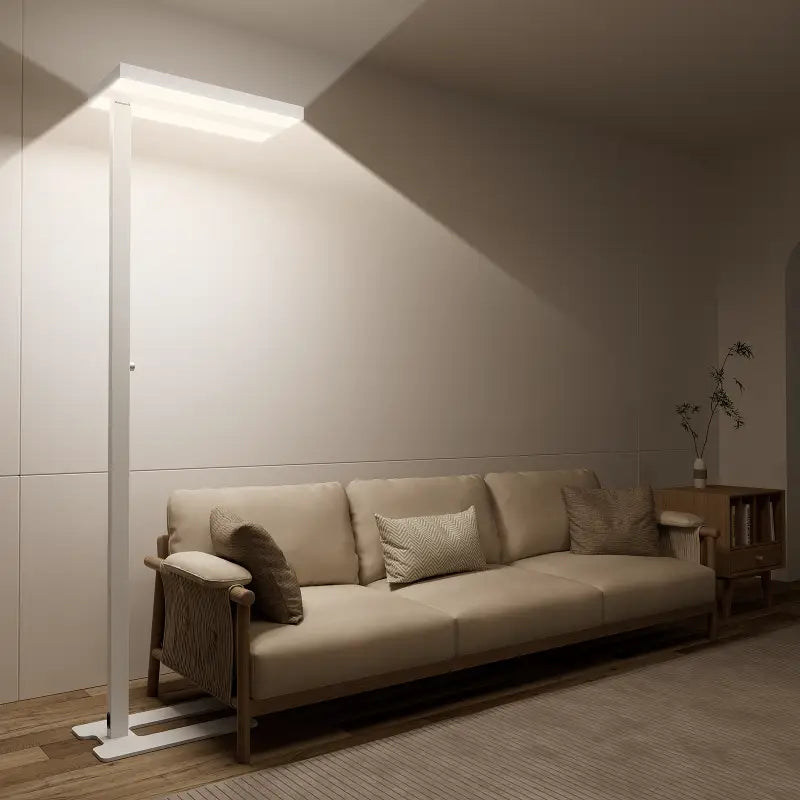 Modern white honeywell 02e floor lamp with sleek rectangular panel providing natural daylight for living room use