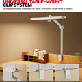White adjustable honeywell 05b02 clip desk lamp with sleek modern design and led daylight lighting for artists