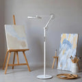 White adjustable floor lamp with articulated arm for targeted lighting honeywell 05d01 artist daylight floor lamp