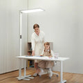 White adjustable floor lamp with rectangular panel and modern design from honeywell 06e ultra for natural daylight use