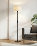 Black metal floor lamp with cylindrical beige fabric shade honeywell f3 soft led retro design for soft ambient lighting