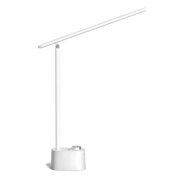 White minimalist honeywell h01 foldable desk lamp with adjustable arm and silver control knob for eye protection