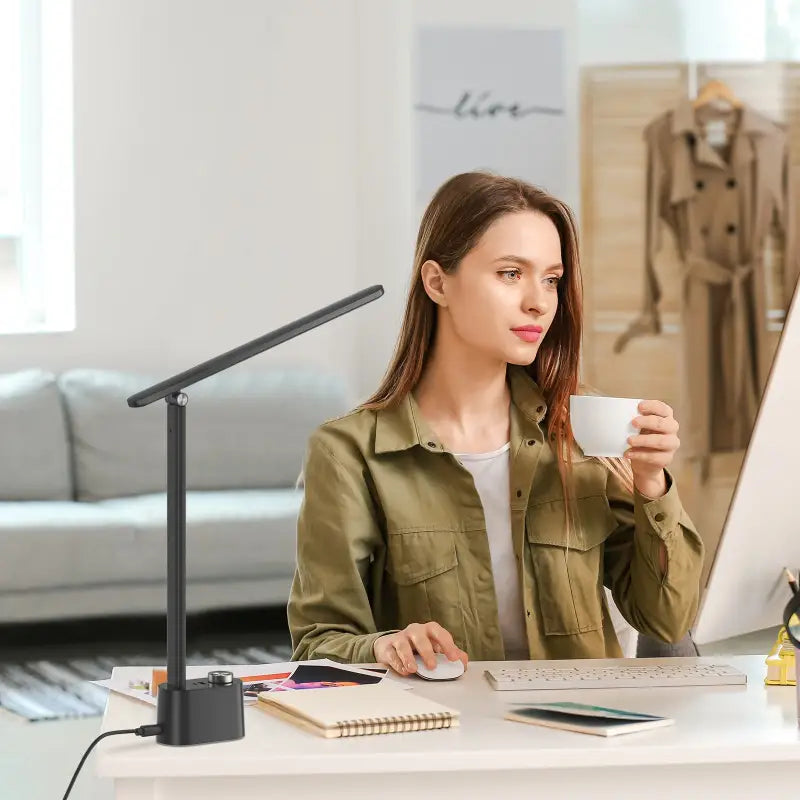 Black adjustable desk lamp with sleek minimalist design honeywell h01 pro portable foldable desk lamp