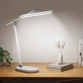 Modern white honeywell h4 intelligent desk lamp with adjustable arm and color temperature control for workspace lighting
