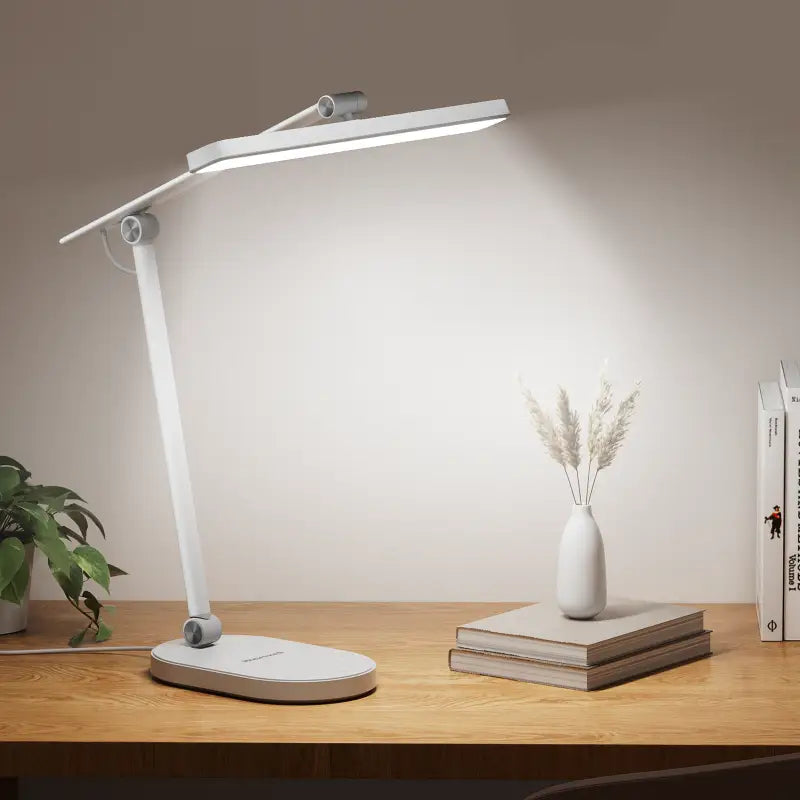 Modern white honeywell h4 intelligent desk lamp with adjustable arm and color temperature control for workspace lighting