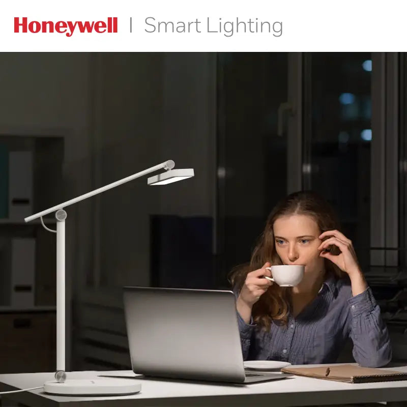 White honeywell h4 intelligent desk lamp with adjustable arm and color temperature control for modern lighting