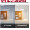 White Honeywell H4 intelligent modern LED desk lamp with adjustable arm and auto-dimming color temperature features