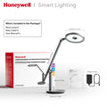 Honeywell h6 desk lamp with sleek silver metallic finish and adjustable circular head for home office task lighting