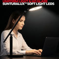 Black honeywell h6 desk lamp with adjustable arm and circular led head emitting soft uniform light for home office