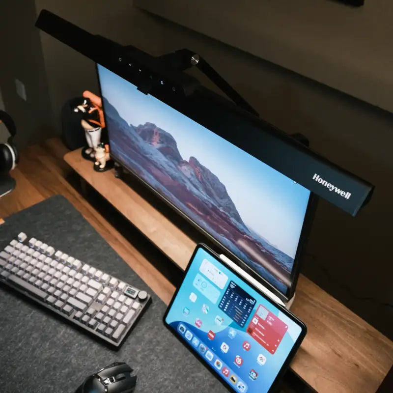 Black honeywell hj1 desk lamp with clamp featuring sleek modern design and adjustable arm for architect desk use