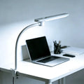 White adjustable honeywell hj2 clip desk lamp with flexible gooseneck and sleek minimalist design for workspace lighting