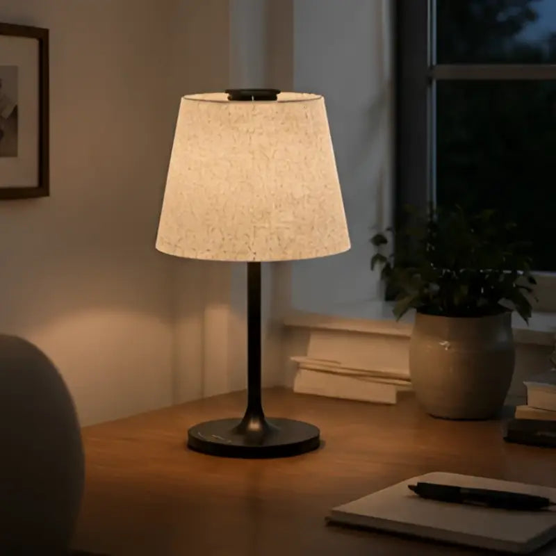 Honeywell hwt-m2 table lamp with warm-toned dark metal base textured off-white fabric shade and built-in charging port