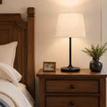 Honeywell hwt-m2 table lamp with warm-toned textured off-white fabric shade black metal base and charging port