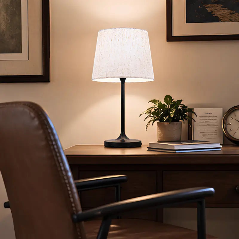 Black metal honeywell hwt-m2 table lamp with textured white fabric shade and built-in charging port for convenience