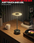 Honeywell m4 portable rechargeable cordless led table lamp with circular illuminated head and sleek metallic base