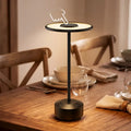 Honeywell m4 portable rechargeable cordless black led table lamp with circular illuminated top and sleek base