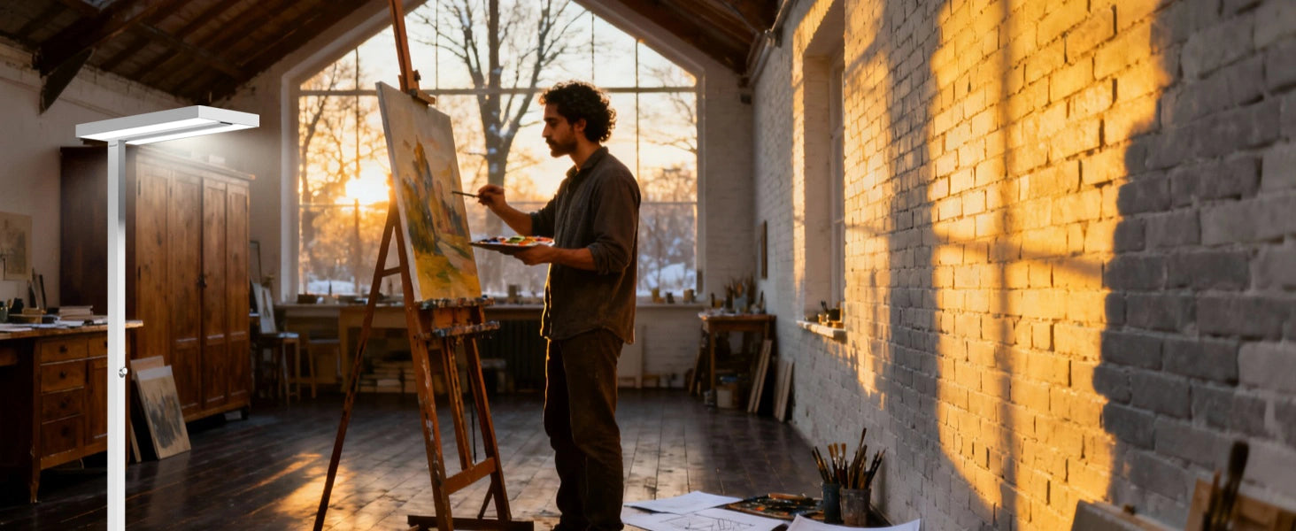 Remote work desk setup with floor lamp positioned behind monitor to eliminate screen glare during winter